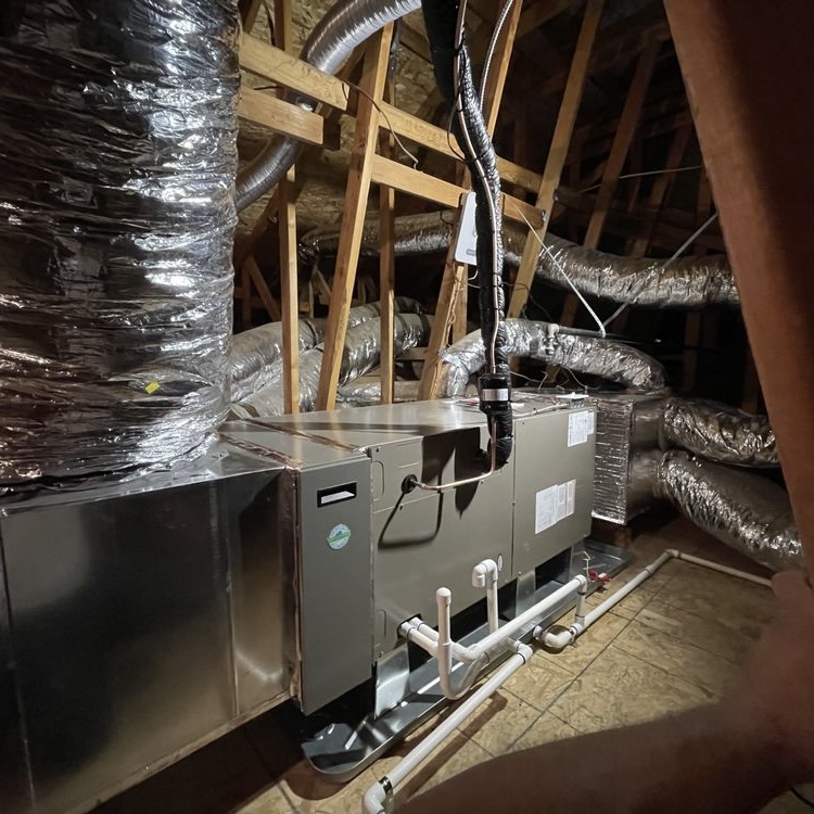 Professional HVAC installation of air conditioning and heating system